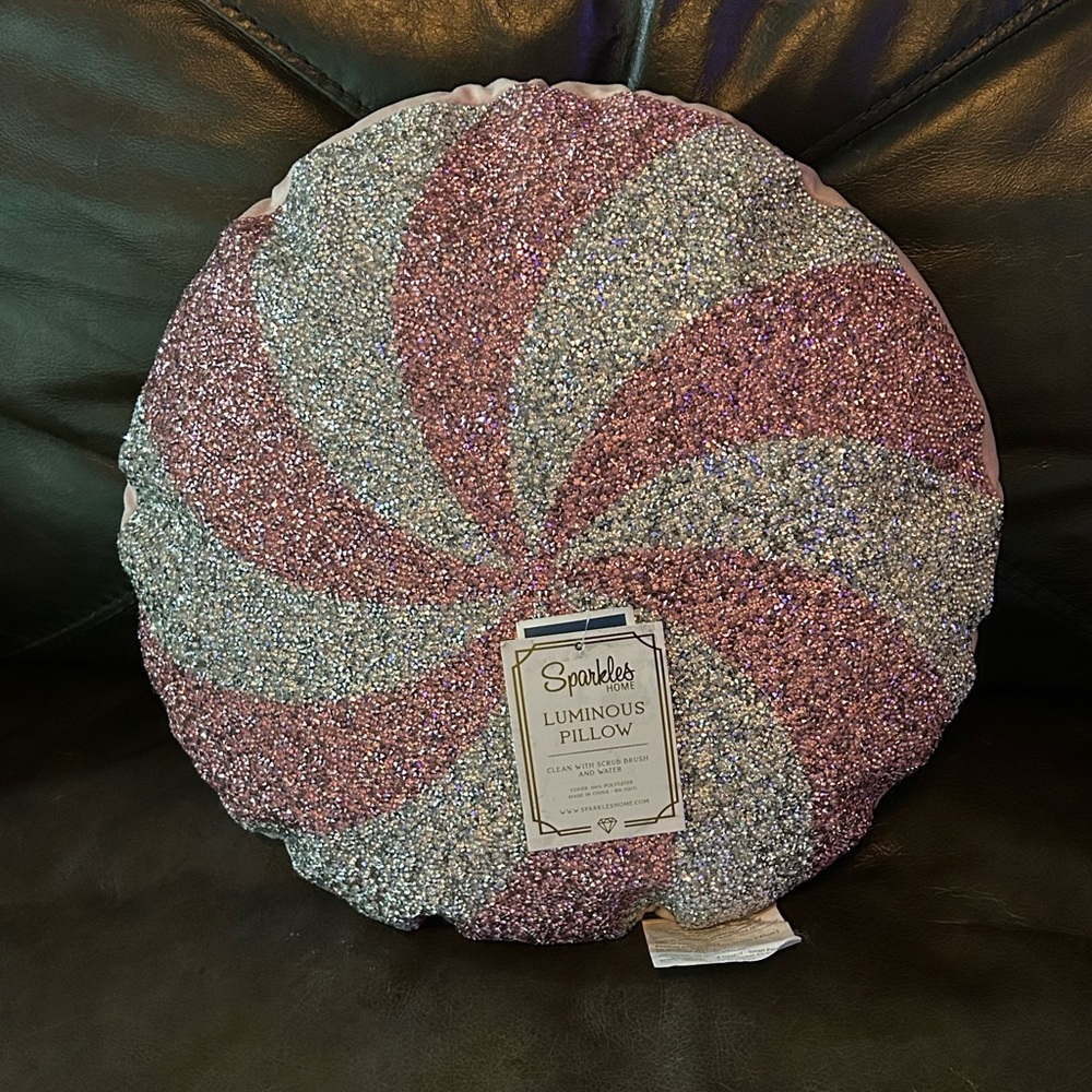 Sparkles Home Luminous Peppermint Swirl Pillow in Pink